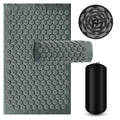Tapis d’acupression avec oreiller pour soulager les tensions et favoriser la relaxation.