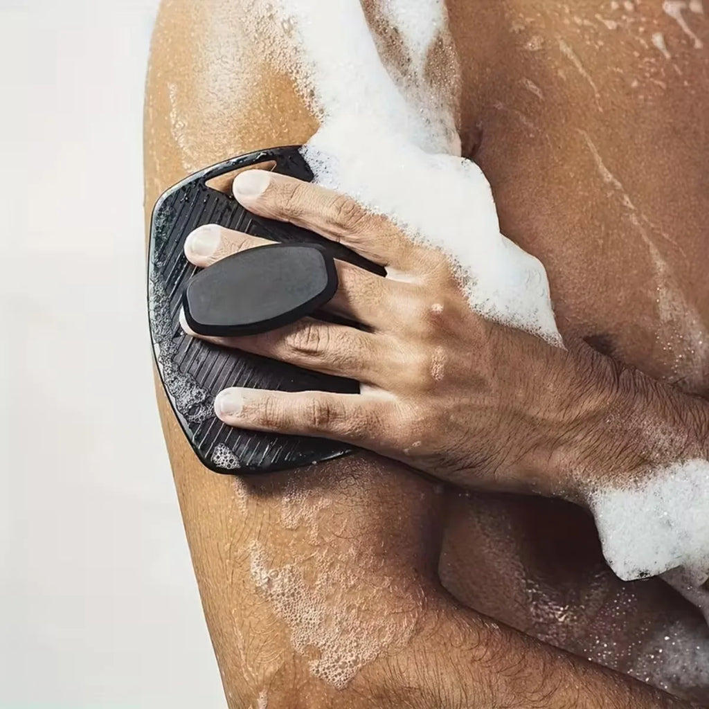 Brosse de douche en silicone douce pour le corps, le visage et les cheveux, exfoliante et adaptée aux peaux sensibles.
